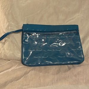 Morgan Home- Travel/makeup bag, blue colored w/white lettering & strap